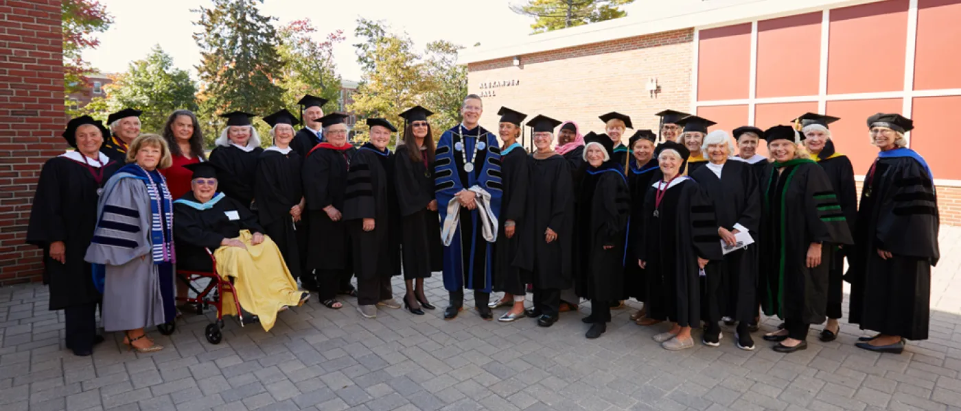 U N E President James Herbert with members of the Deborah Morton Society