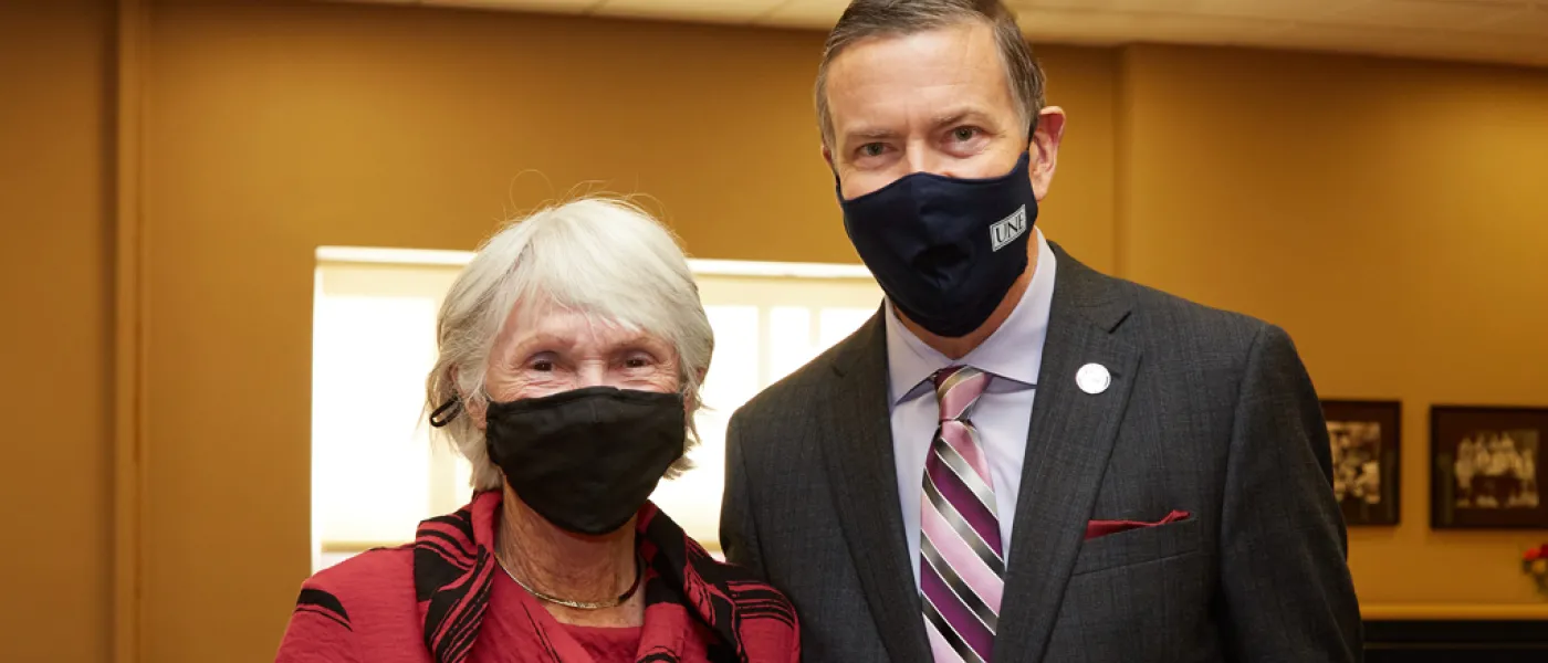 U N E President James Herbert with a member of the Deborah Morton Society