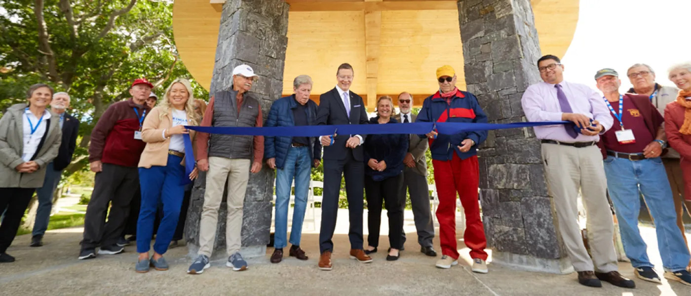 President Herbert performing a ribbon cutting at Jordan Point