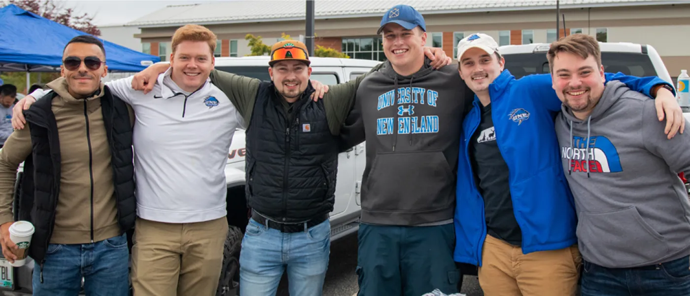 U N E students at a tailgate