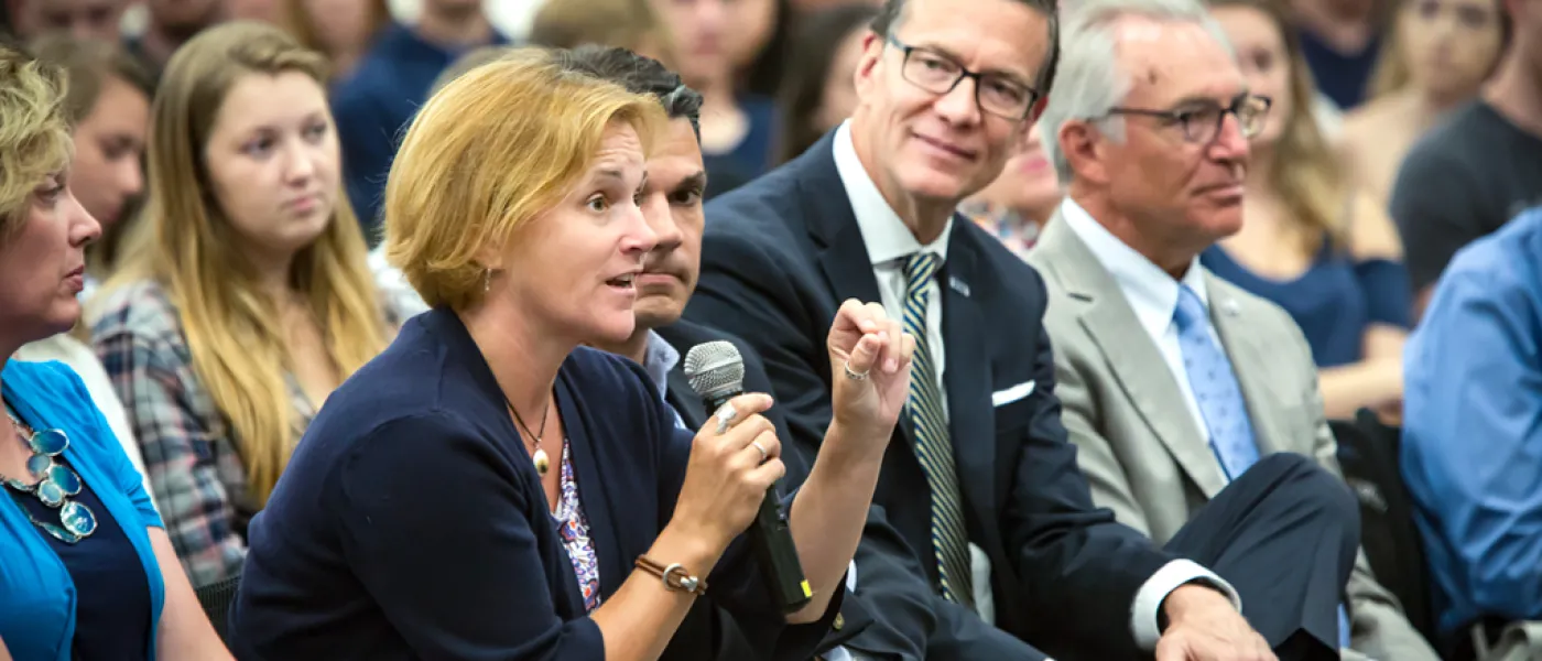 UNE staff member asking a question at the President's Forum