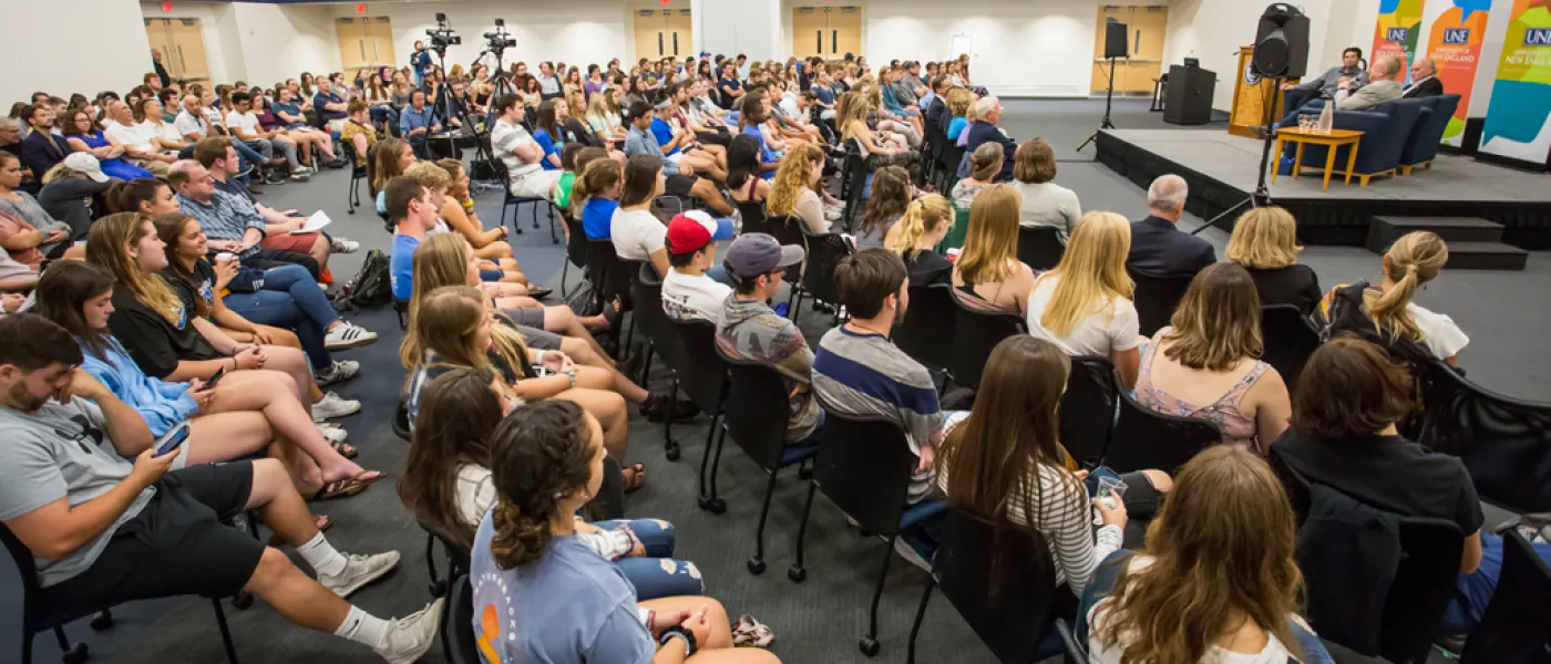 Crowd watching speakers at the President's Forum