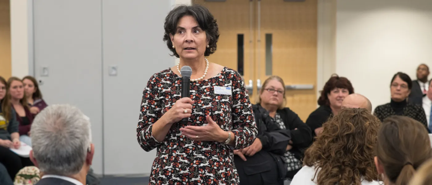 UNE staff member asking a question at the President's Forum