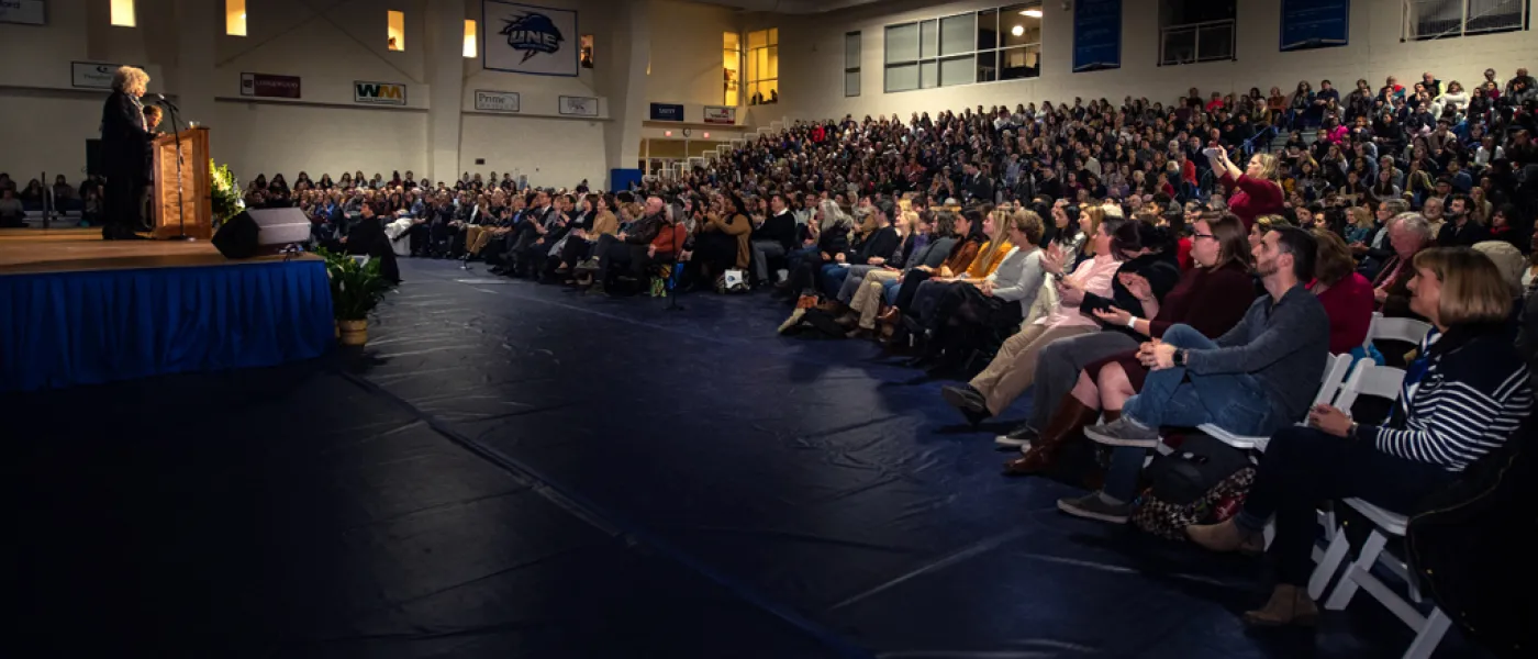 Angela Davis speaking to a crowd at UNE