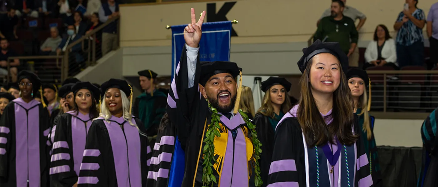 Students process into the Cross Insurance Arena