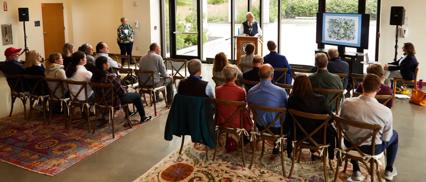 A St. Francis alum gives a speech at a Homecoming 2022 event