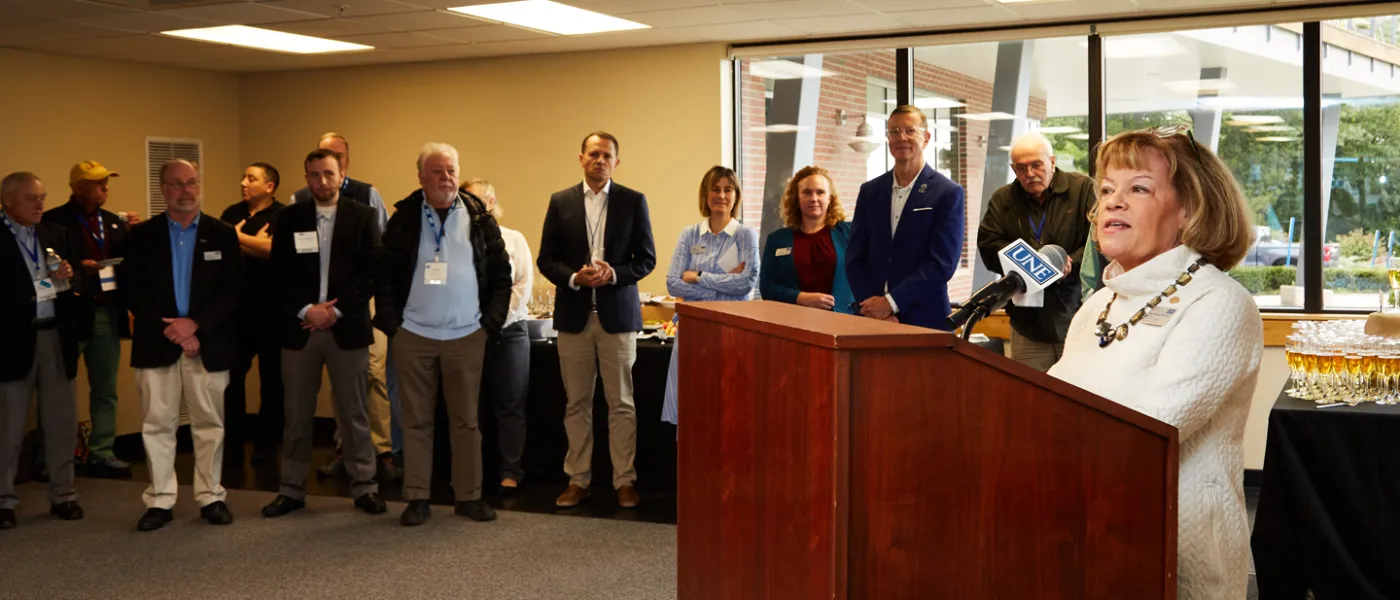 A speaker presents to St. Francis alumni at a 2022 Homecoming Weekend event