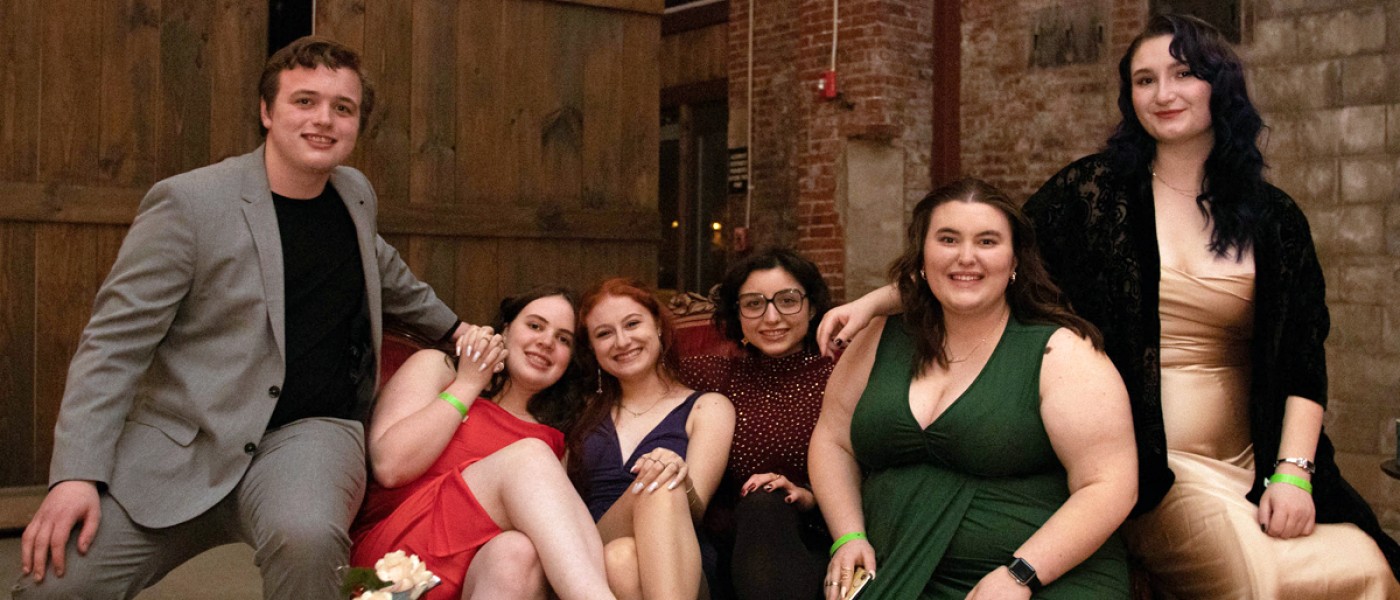 Six students sitting together at the Spring Dance