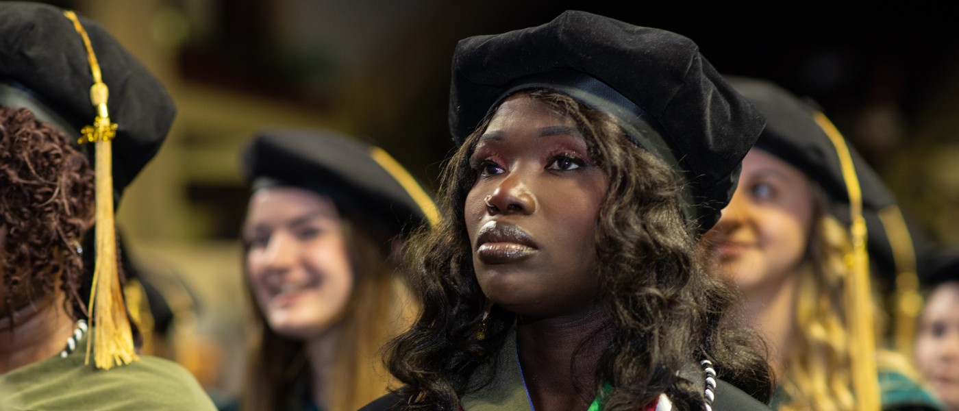 UNE graduates look on at the Cross Insurance Arena in Portland