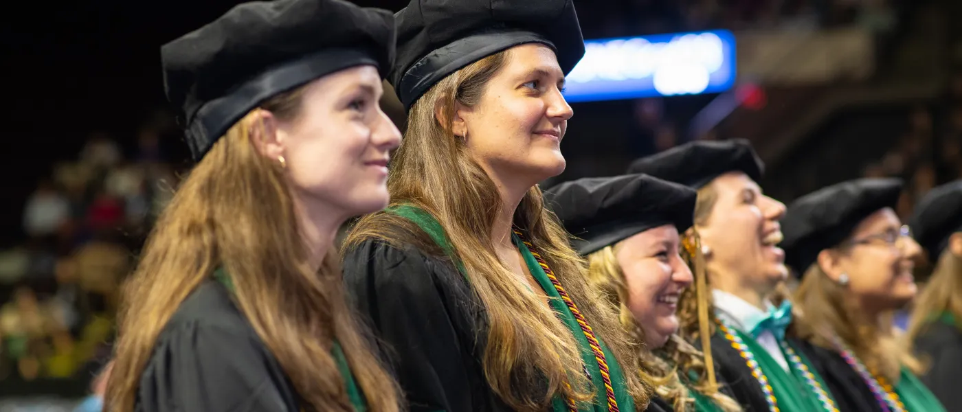 UNE graduates look on at the Cross Insurance Arena in Portland