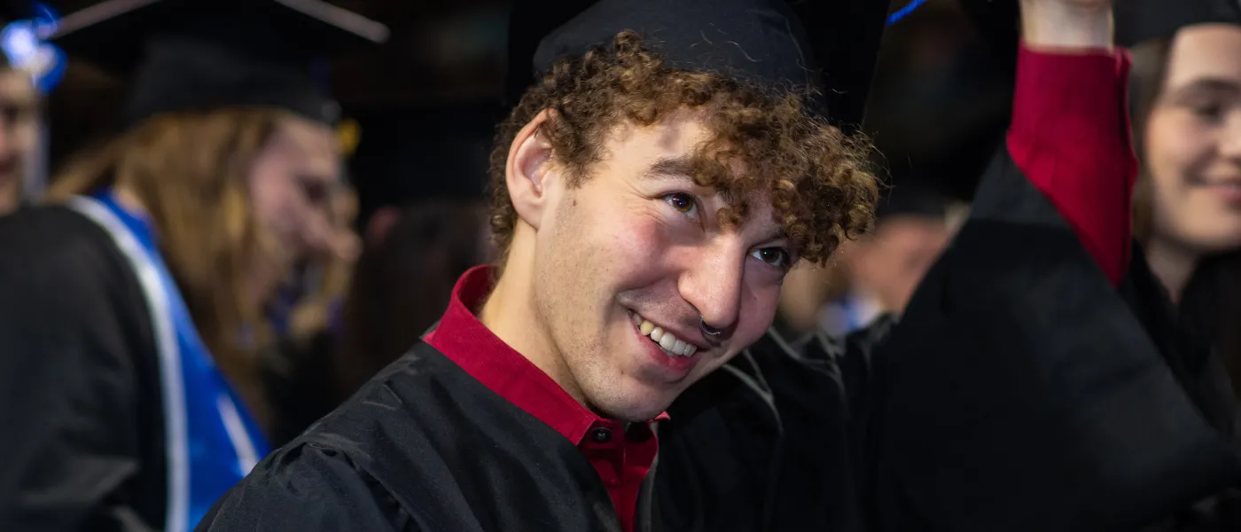 A UNE graduate look on at the Cross Insurance Arena in Portland