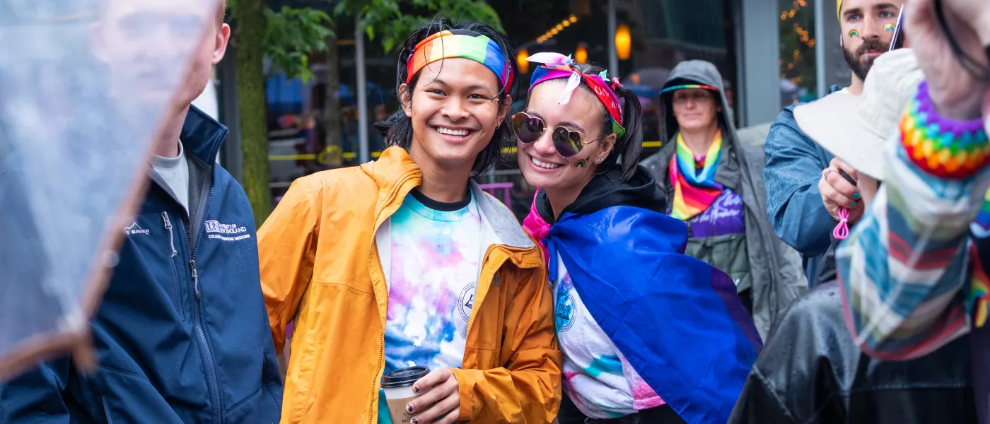 Two students pose for a photo