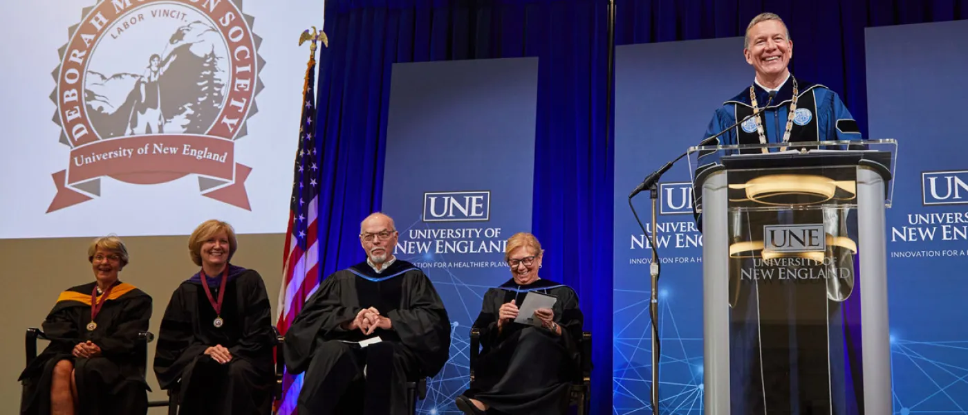 President Herbert speaks from the stage of the Deb Morton ceremony