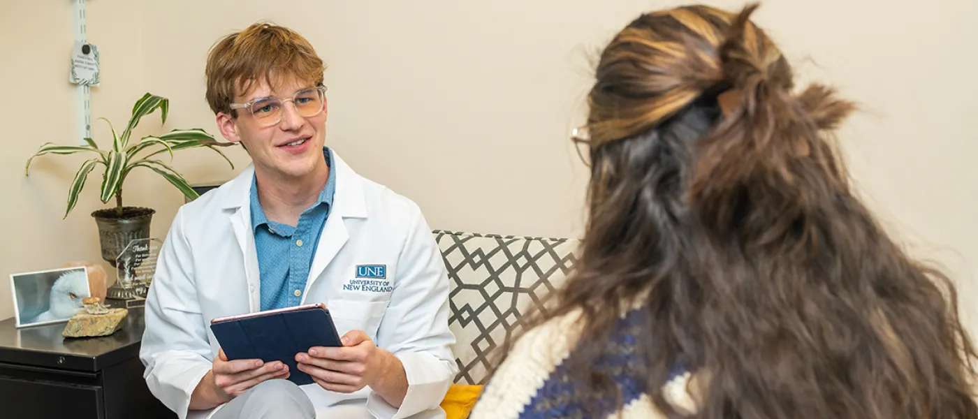 A Psychiatric Mental Health Nurse Practitioner student practices a therapy session with another student