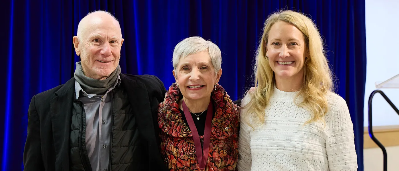 Karin Gregory takes a group photo with two others at the Deborah Morton Society ceremony