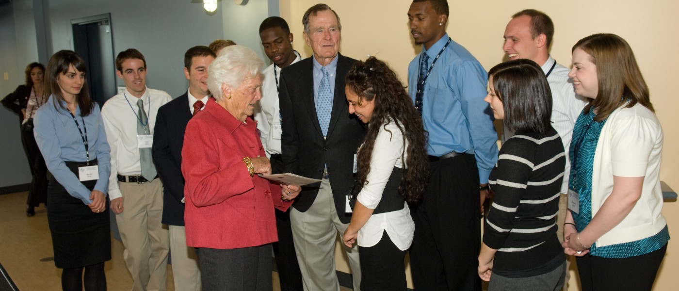 George and Barbara Bush greet U N E students in the Bush Center