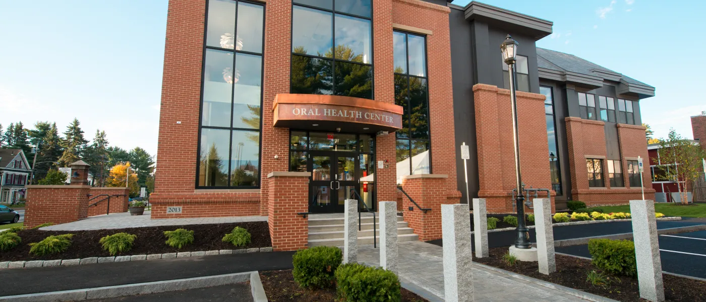 The brick exterior of U N E's Oral Health Center