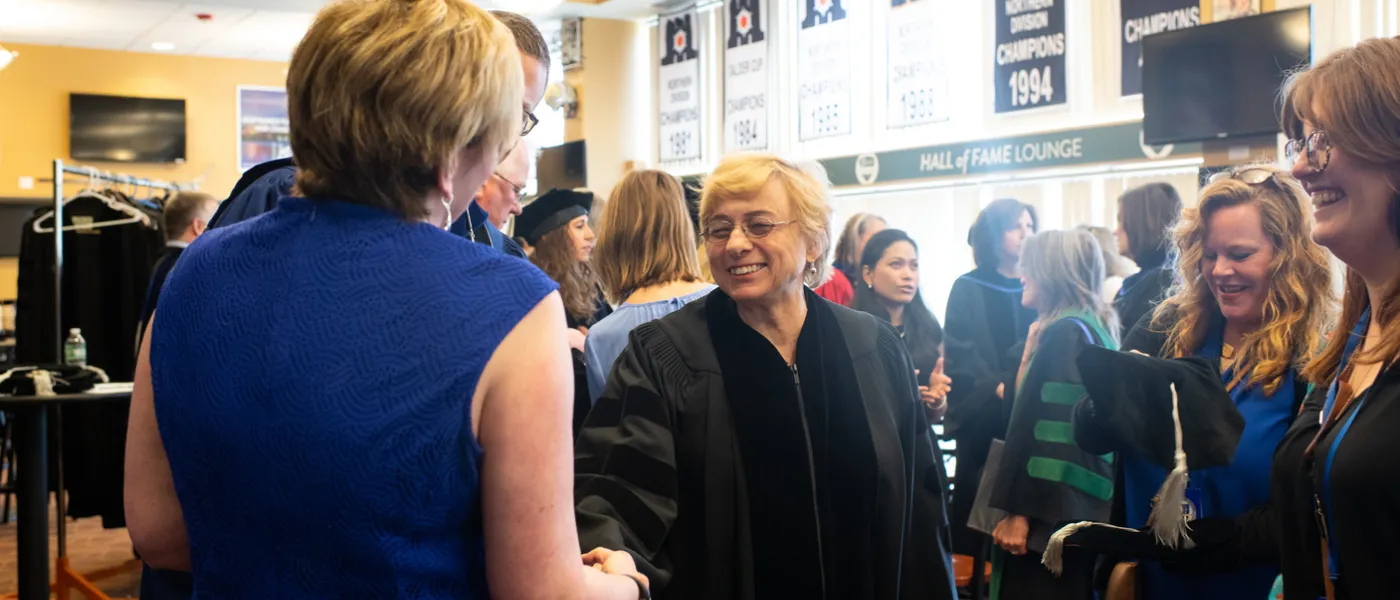 Governor Mills greets guests at commencement