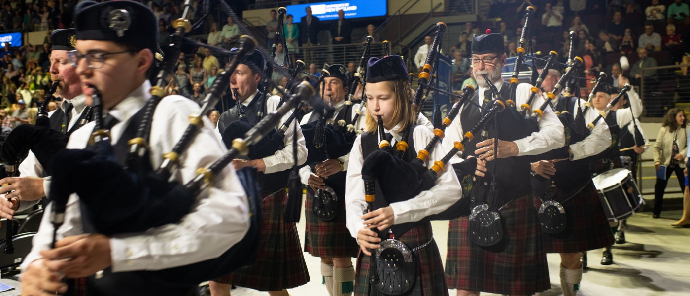 A band plays bagpipes at commencement