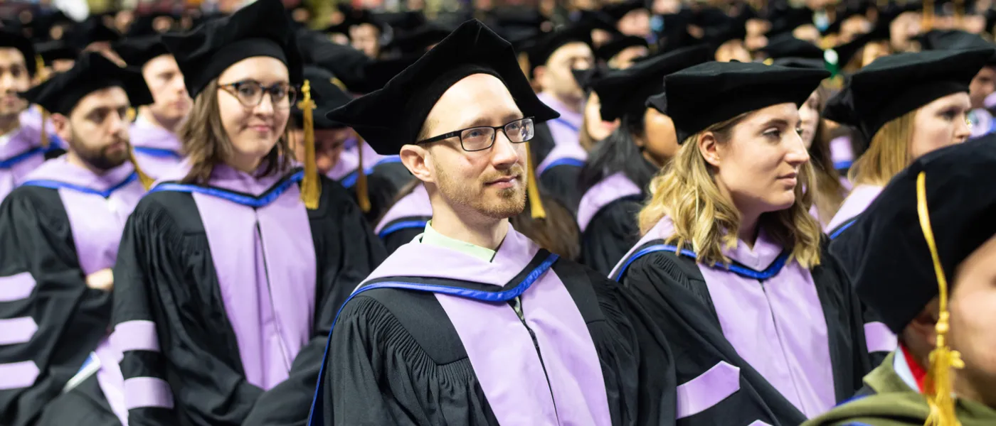 Faculty sit during commencement