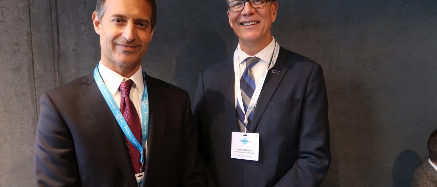 Dillon Banerjee of the U.S. Embassy in Stockholm with President Herbert
