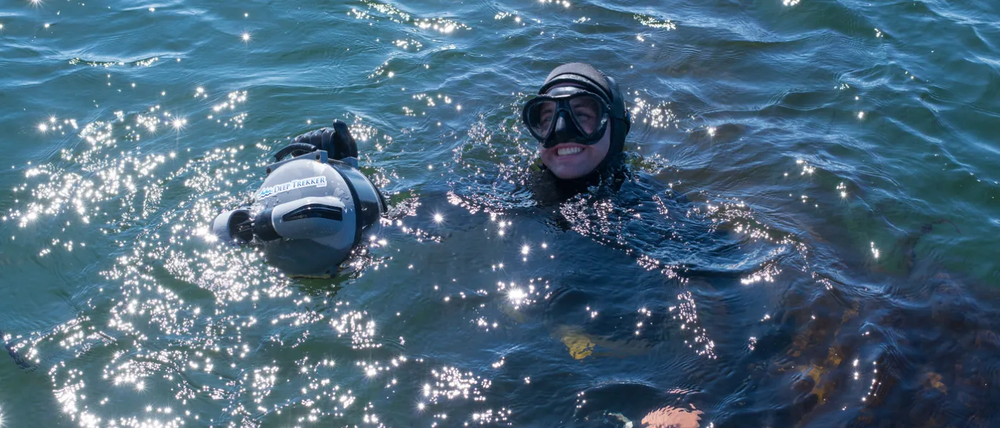 Students snorkel in the ocean