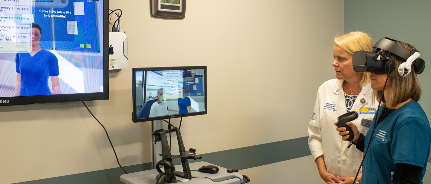 A student uses the virtual reality patient simulator