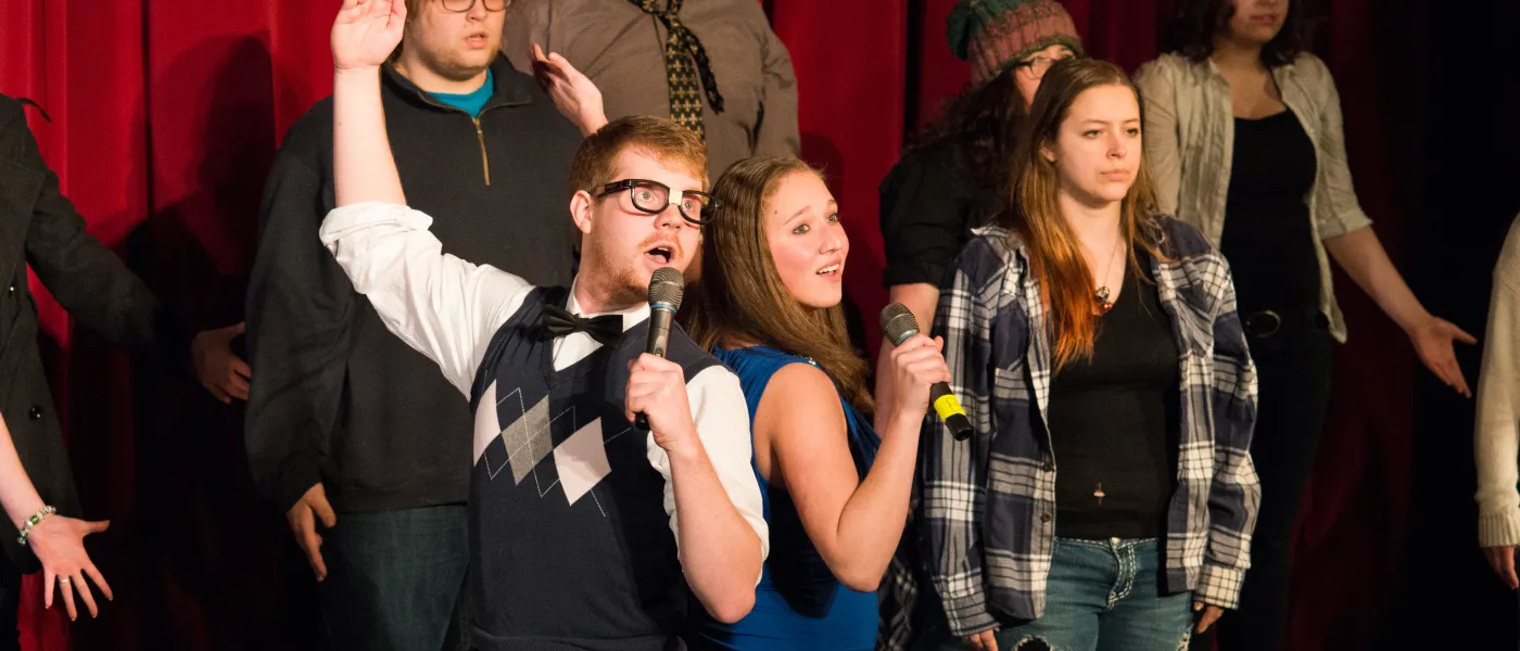 A group of U N E students performing at the Annual Variety Show