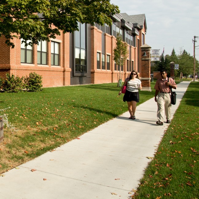 two students walk to the portland campus