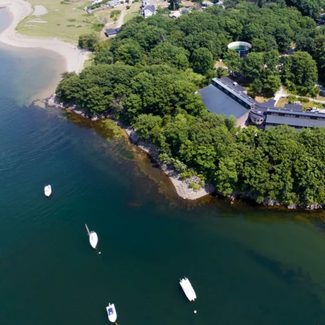 An aerial view of the coast off of U N E's Biddeford campus