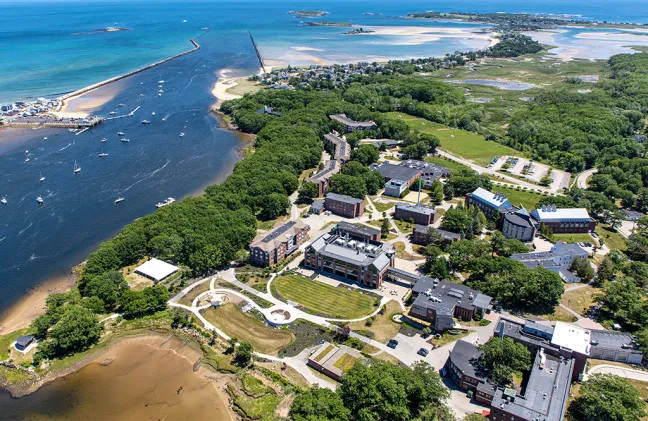 An aerial photo of the Biddeford Campus including the Saco River and Atlantic Ocean