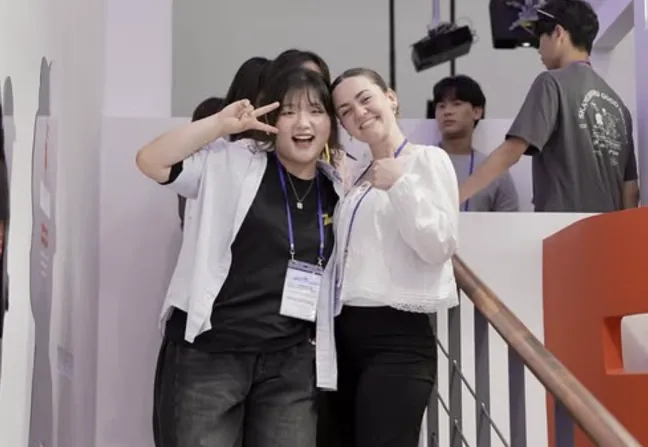 Shauna Curran and a friend pose for a photo in Busan