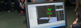 a computer screen shows a three D model used in motion analysis