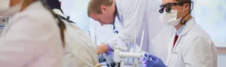 dental students practicing in the oral health center