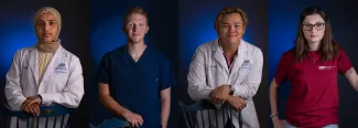 Portraits of four U N E students, two graduate and two undergraduate, in front of a blue wall