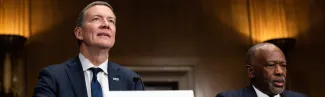 UNE President James Herbert testifies at a congressional hearing