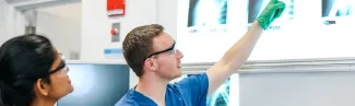 Students evaluate x-rays in the human body donor lab