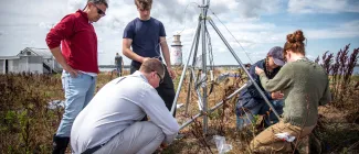 UNE students, faculty, and innovation staff install weather sensors on UNE's Ram Island