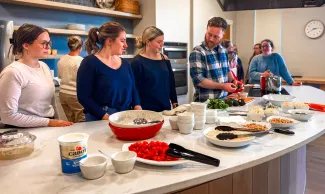 UNE students prepare ingredients for a cooking demonstration