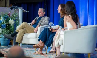 George W. Bush speaks in a panel discussion