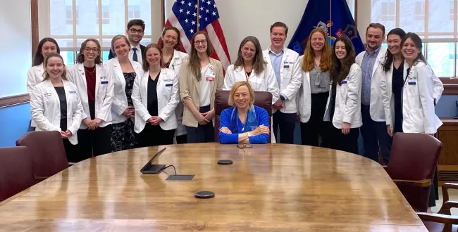 UNE medical students and administration pose with Maine Gov. Janet Mills