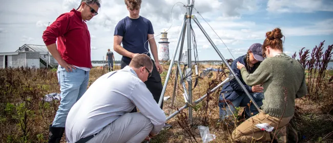 UNE students, faculty, and innovation staff install weather sensors on UNE's Ram Island