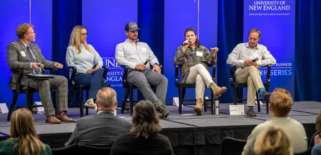 Onstage panelists discuss ocean business solutions