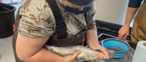 student with salmon