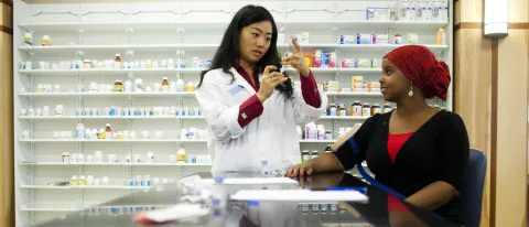 Pharmacy student gets ready to administer a shot