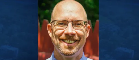 head shot photo of Marc Ebenfield