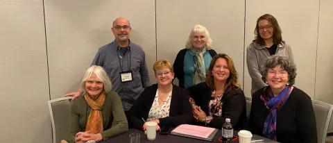 Faculty present on interprofessional education at a summit in Chicago
