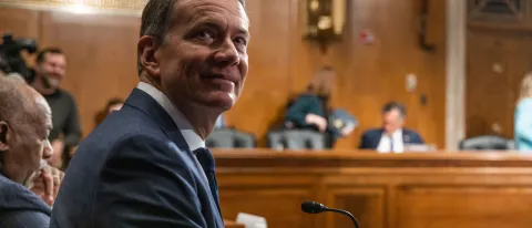UNE President James Herbert in a Congressional chamber during testimony