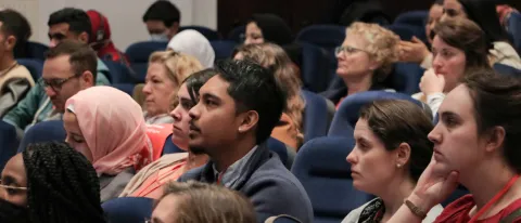 Photo of students sitting in an auditorium on the Tangier campus