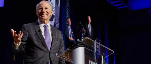 Richard Haass stands onstage